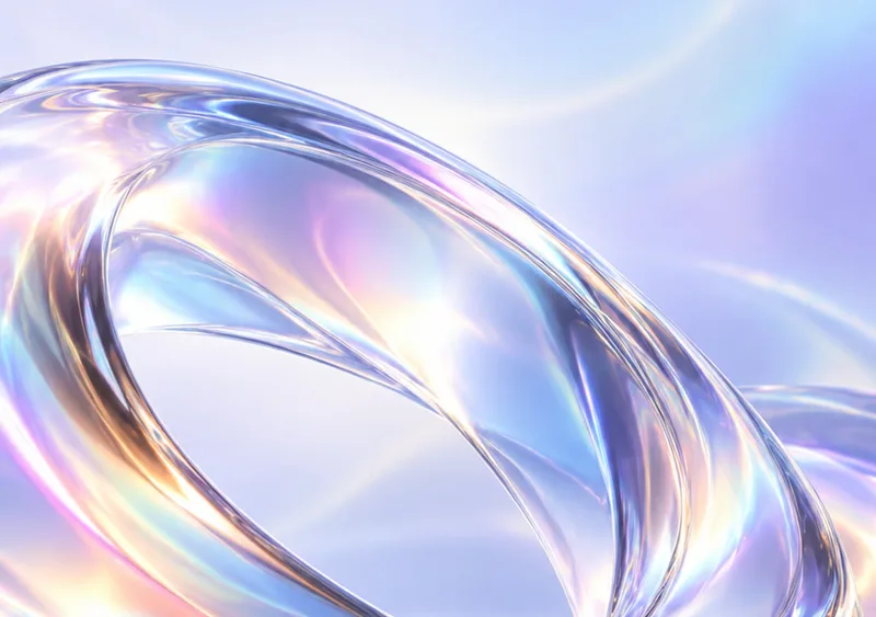An iridescent glass loop floats through pale blue and lavender light. — Inner Display