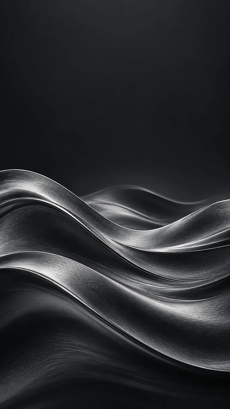 Layered graphite waves leave a calm charcoal sky above. — iPhone 18 Pro Max